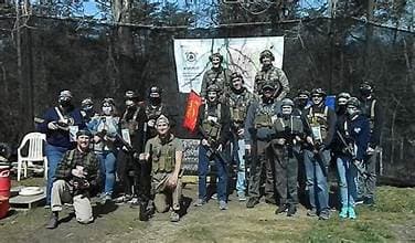 Squad photo with the WarPlay banner after a match